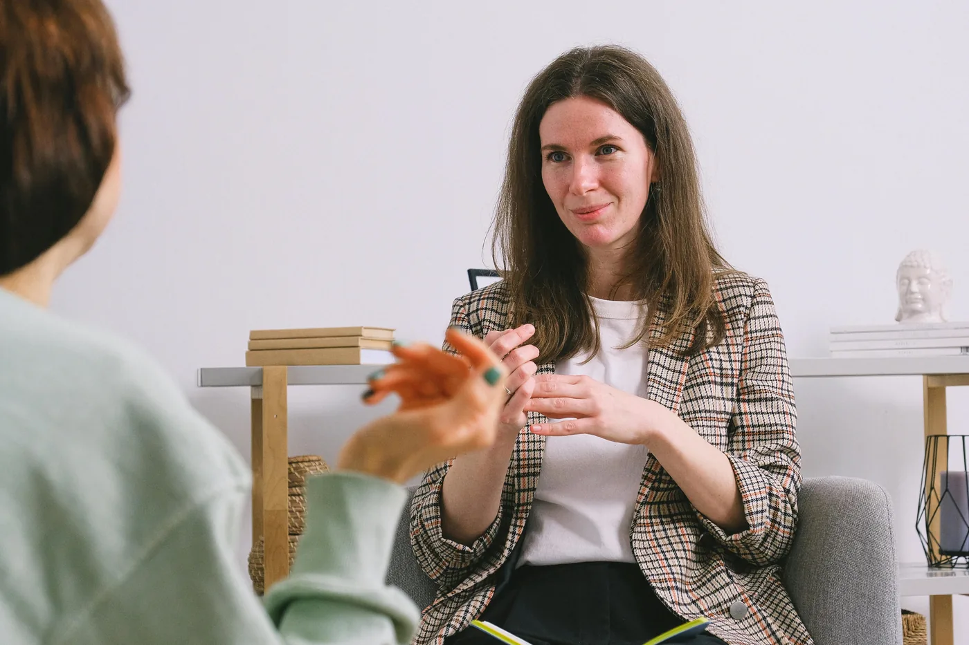 A Clinical Psychologist listening during a therapy session